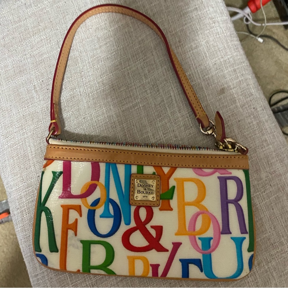 Dooney and Bourke multi color small clutch